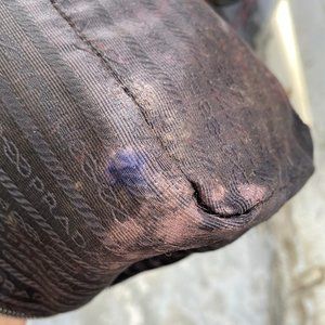 photos of prada bag purchased on poshmark